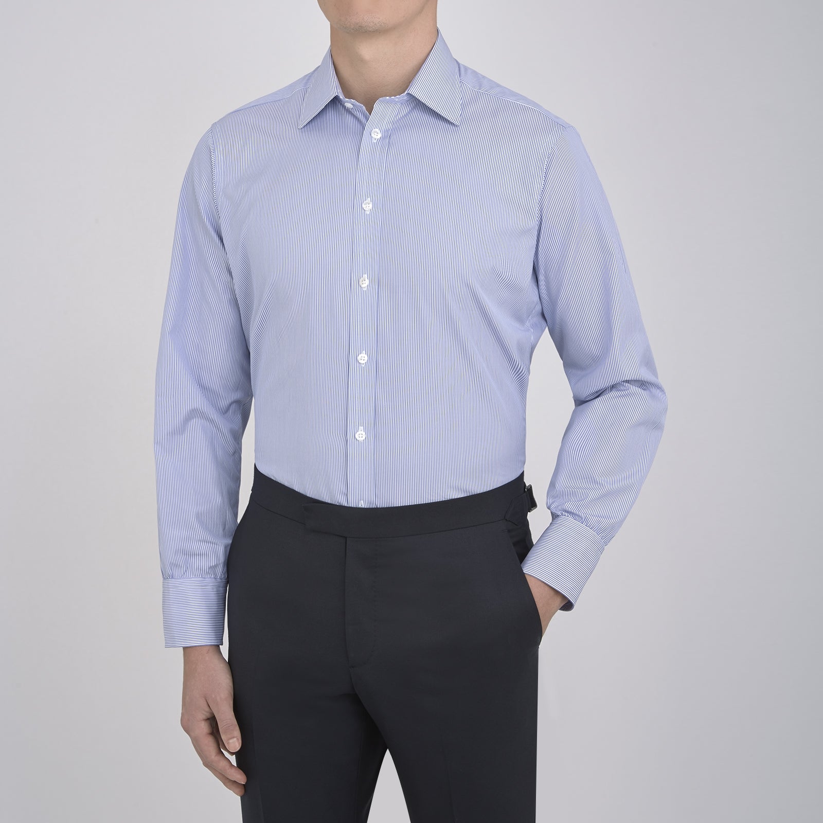 View 5 of product The Turnbull & Asser Blue Fine Bengal Stripe Shirt features a classic T&A collar, 3-button cuffs, and white buttons, crafted from fine cotton and displayed against a crisp white background.