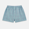 View 4 of product The Pale Blue And Green Multi Check Godfrey Boxer Shorts by Turnbull & Asser feature Italian cotton, an elastic waistband, and a grid of multicolored checks. These luxury men's boxers are shown laid flat on a white background.