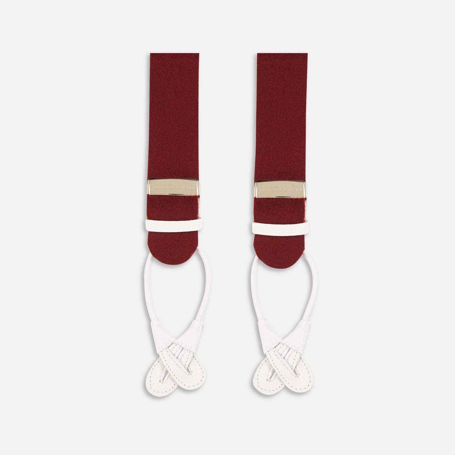View 1 of product A pair of Turnbull & Asser Bordeaux Adjustable Felt Braces, featuring white leather ends and gold metal adjusters, made in England, are displayed vertically on a plain white background.