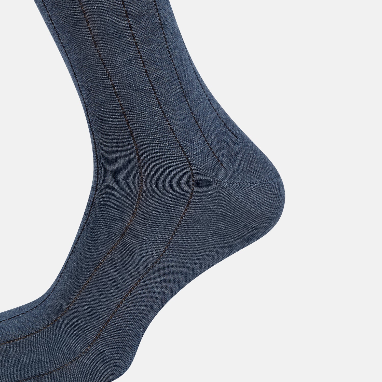View 4 of product The Ash Dash Striped Long Sock by Turnbull & Asser—a single knee-high, dark blue over-the-calf sock with ribbed texture—is displayed on a plain, light background.