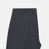 View 4 of product The Ash Linen Herringbone Edmund Trousers by Turnbull & Asser feature a straight-leg fit, button closure, belt loops, and side pockets in summer-ready fabric—ideal for utility dressing—shown against a plain white background.