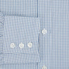 View 4 of product The Turnbull & Asser Blue Micro Shadow Check Mayfair Shirt features a long-sleeve, button-up design with a small blue and white check pattern, pointed T&A collar, and classic cuffs.