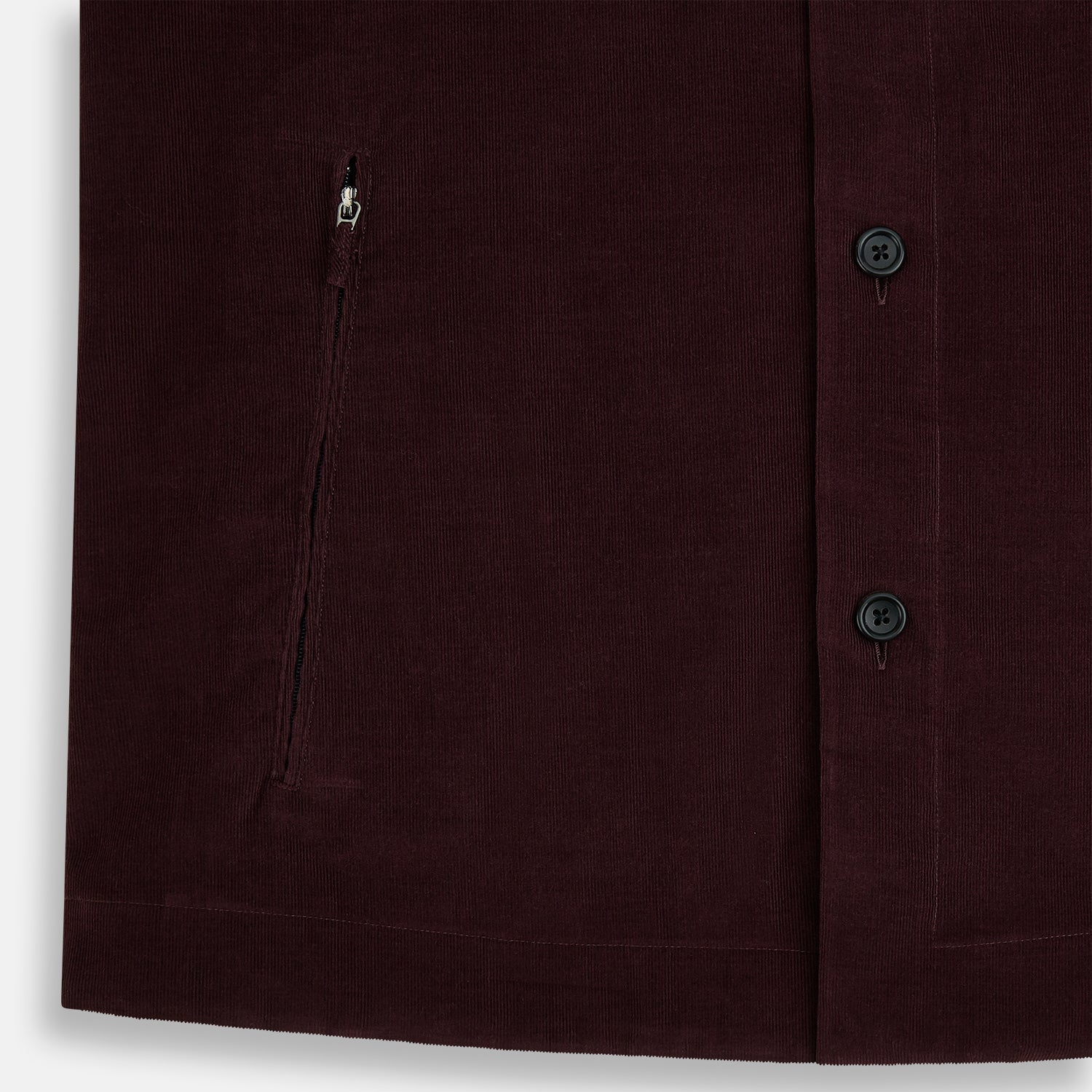 View 6 of product The Turnbull & Asser Burgundy Corduroy Hampstead Overshirt features long sleeves, a collar, a large left chest pocket, and two zippered side pockets, shown laid flat on a plain white background.