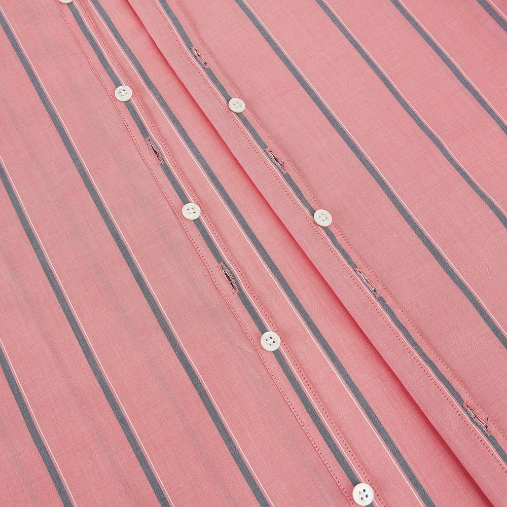The Coral Pink Track Stripe Westminster Shirt by Turnbull & Asser features vertical navy and white stripes, a tailored fit, pointed collar, and buttoned cuffs—is displayed laid flat on a white background.