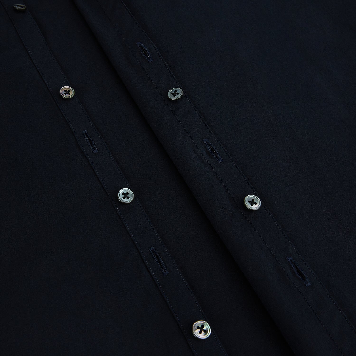 View 7 of product The DARK NAVY WINDSOR SHIRT by Turnbull & Asser is a long-sleeve shirt with a refined Windsor collar, showcasing classic British craftsmanship.