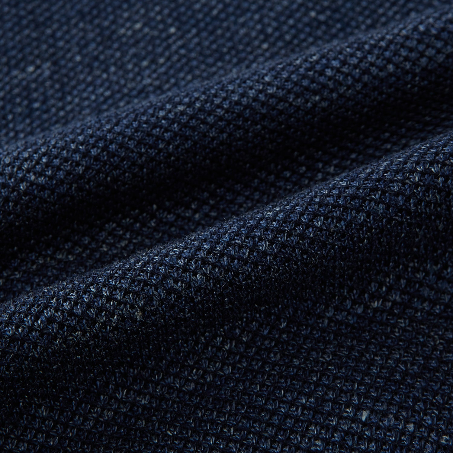 View 5 of product The Turnbull & Asser Navy Linen Blend Cambridge blazer features British tailoring with a notched lapel, two buttons, and three front pockets, shown on a plain white background.