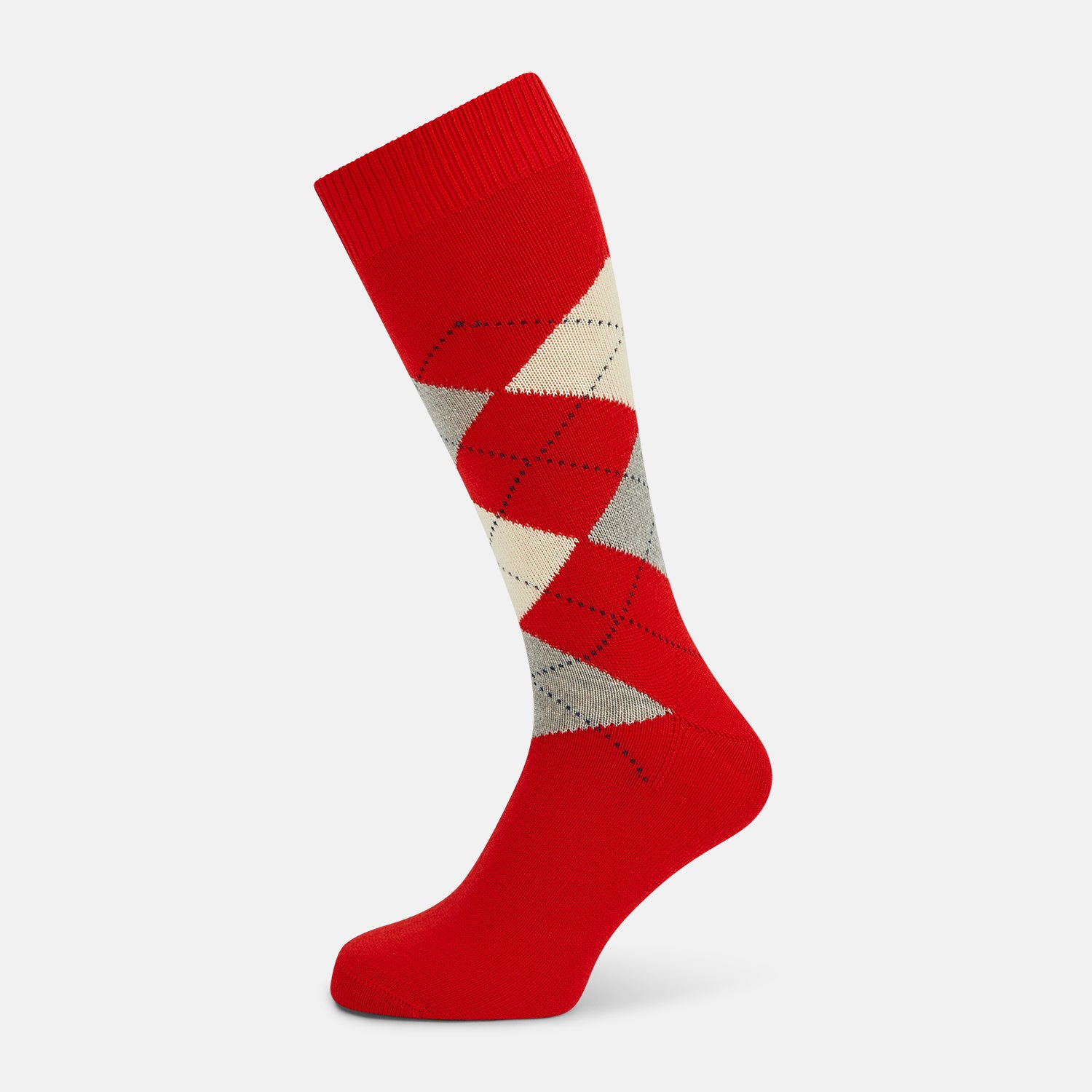 View 1 of product Mid-length orange wool socks by Turnbull & Asser, featuring a classic check pattern in orange, beige, and gray, reminiscent of timeless wool socks, displayed on a plain light background.