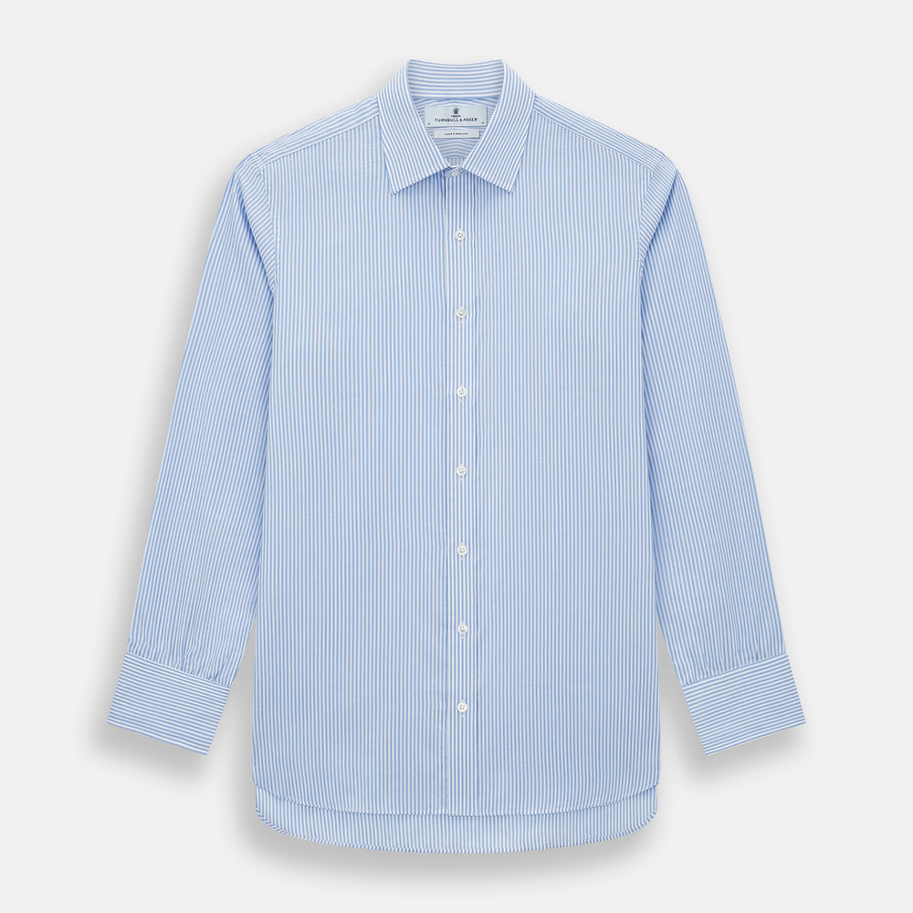 The Turnbull & Asser Blue Bengal Stripe Mayfair Shirt features light blue and white vertical stripes, a classic T&A collar, white buttons, and buttoned cuffs. Laid flat on a white background.