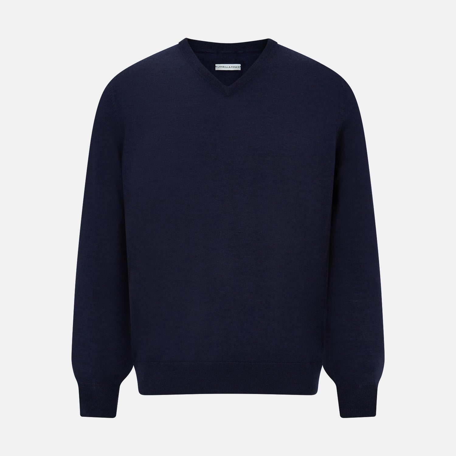 View 6 of product The Turnbull & Asser Navy Fine Merino V-Neck Jumper is displayed against a white background, featuring ribbed cuffs and hem for timeless style in a classic, plain long-sleeve design.
