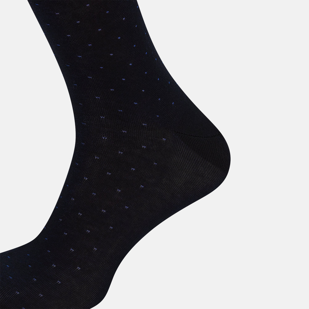 The Turnbull & Asser Navy/Azzurro Polka Dot Mid-Length Sock features subtle light blue polka dots on navy cotton, shown against a plain white background.