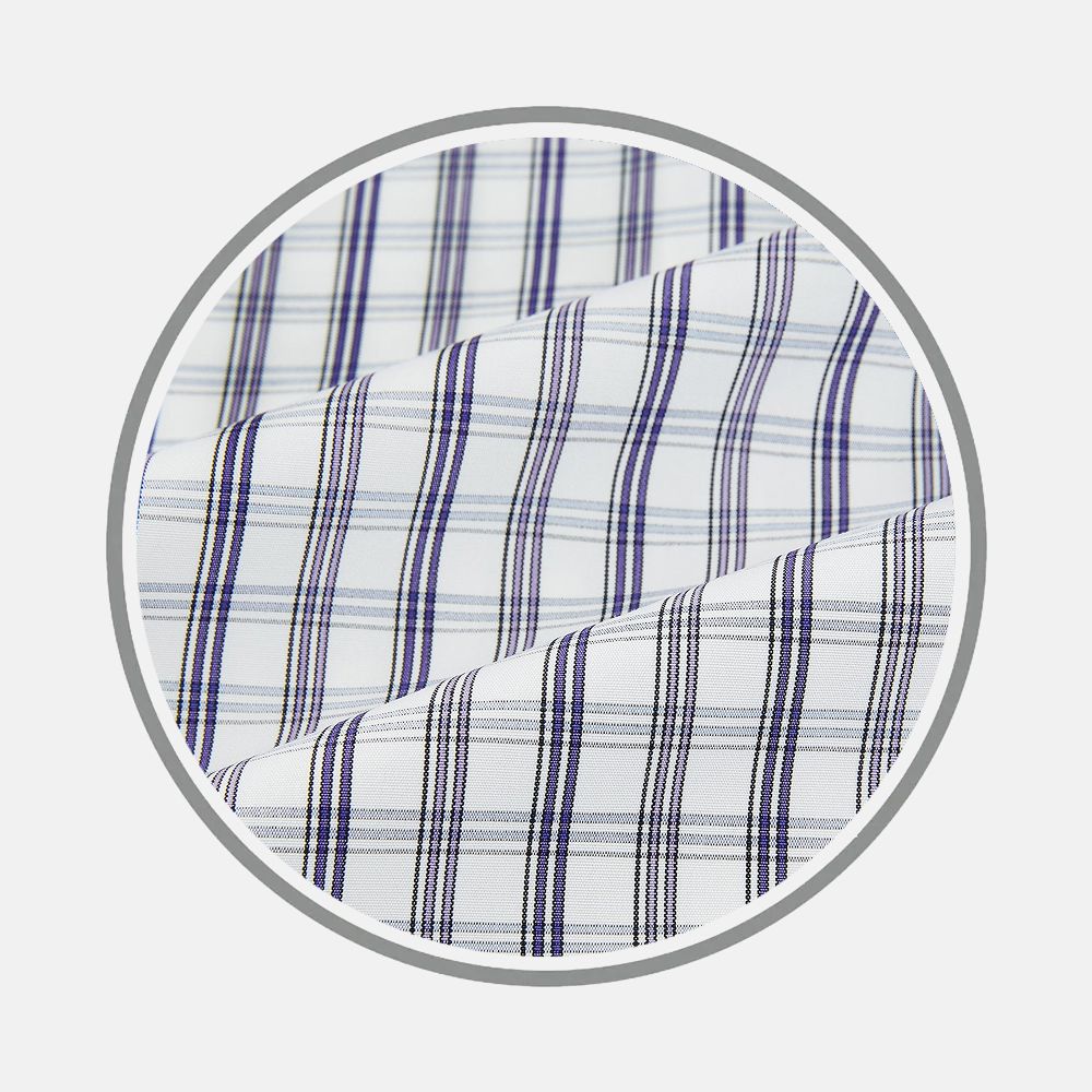 A close-up of the Purple Multi Check Shirt by Turnbull & Asser displays its blue, black, and white plaid fabric inside a circular frame on a plain light gray background.