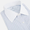 View 2 of product The Turnbull & Asser Pale Blue and Navy Grid Check Shirt features a contrast T&A collar and cuffs, long sleeves, and a button-down front, all displayed on a plain white background.