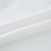 View 6 of product Experience comfort in the Turnbull & Asser White Short-sleeve Pyjama Shirt—a plain crew neck T-shirt laid flat on a white background, perfect as elevated loungewear or a sleek pyjama essential.