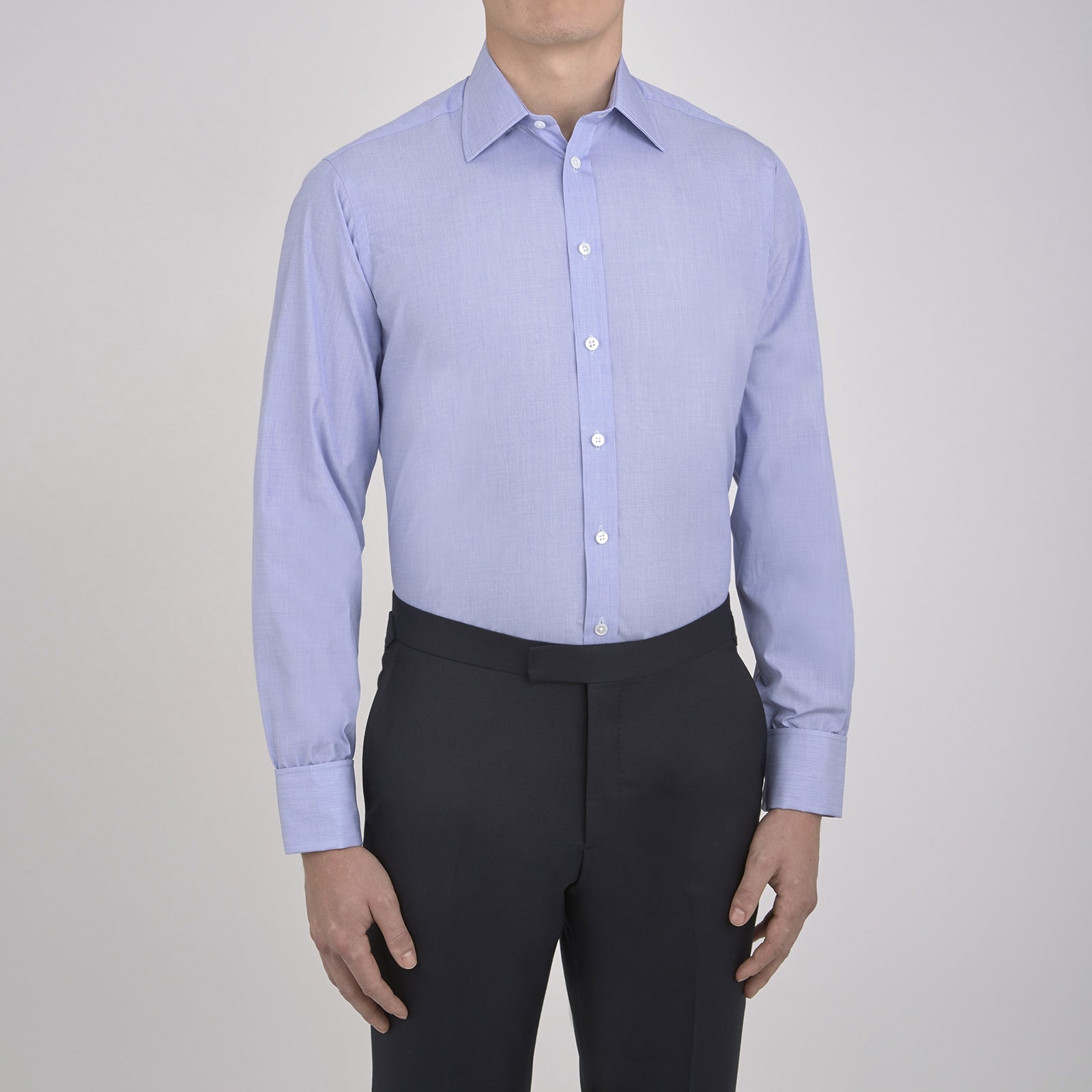 View 5 of product The Turnbull & Asser Blue End-on-End Cotton Shirt features a T&A collar, double cuffs, and white buttons—ideal for smart looks or pairing with a navy suit. Displayed against a plain white background.