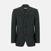 View 1 of product The Turnbull & Asser Moss Green Apsley Single-Breasted Caban Coat, featuring three buttons, a notched lapel, and three front pockets, is showcased on a plain white background.