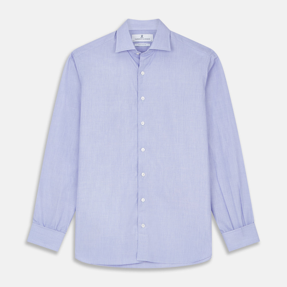 The Turnbull & Asser Tailored Fit Blue End-on-End Cotton Shirt features a Kent collar, double cuffs, and sleek white buttons—an ideal match for a navy suit to complete a sophisticated look. Displayed on a white background.