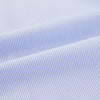 View 6 of product The Turnbull & Asser Pale Blue Hairline Stripe Pyjama Shirt features long sleeves and a single chest pocket, offering an elegant sleepwear style—shown on a plain white background.
