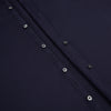 View 7 of product The Navy Textured Windsor Shirt by Turnbull & Asser features long sleeves, a Windsor collar, buttoned cuffs, and white buttons—a fine example of British craftsmanship—set against a plain white background.