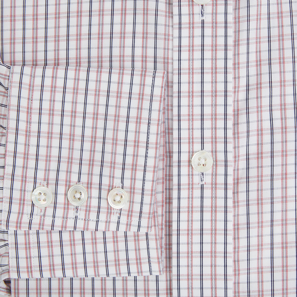 The Turnbull & Asser Red and Blue Multi Check Mayfair Shirt is a long-sleeve button-down made from Italian cotton with a white base and a light red and blue check pattern, shown laid flat on a white background.