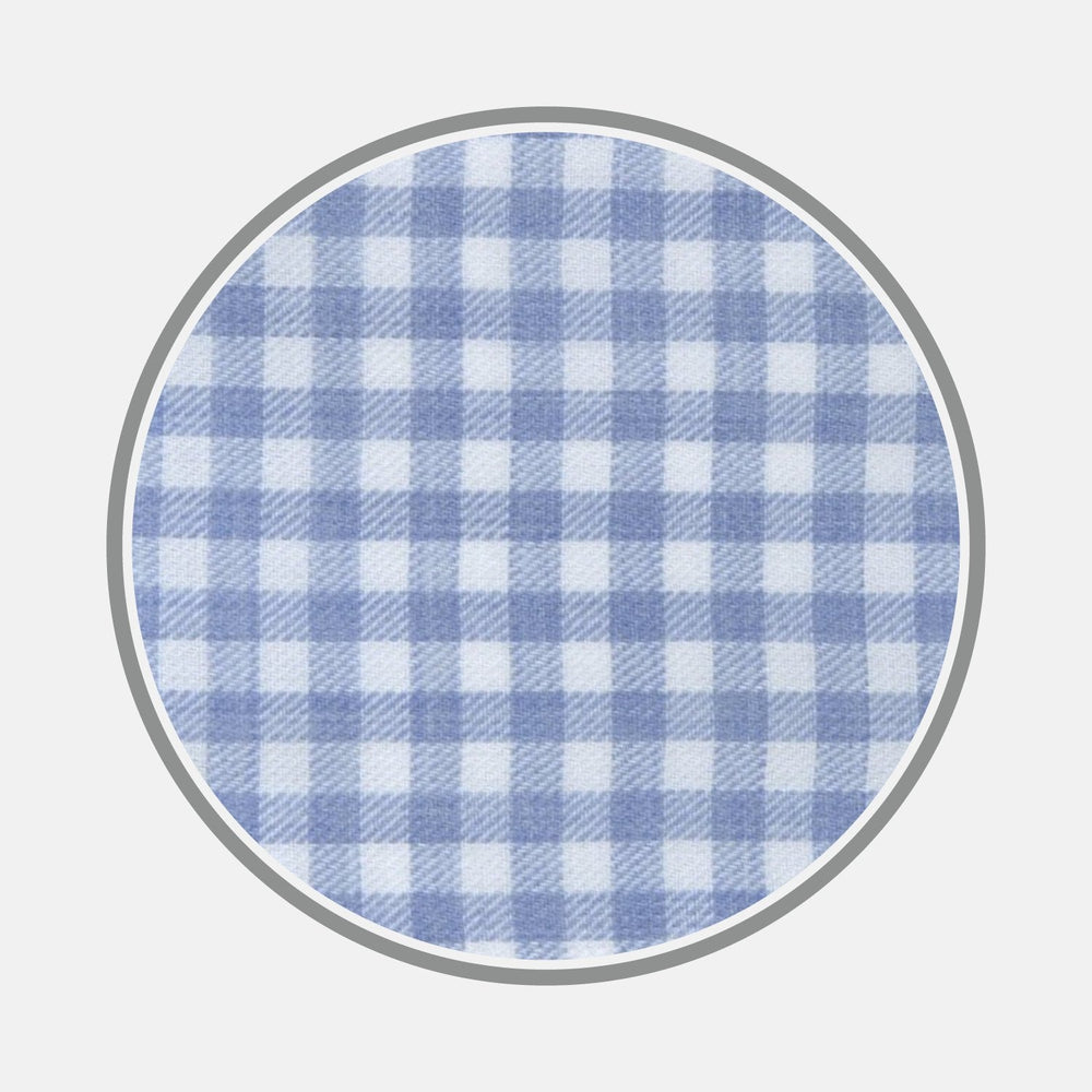 BESPOKE FABRIC 1115 06 by Turnbull & Asser: a circular blue and white gingham check fabric swatch, thin gray border, on a plain white background—perfect for custom shirts or trying out monograms.