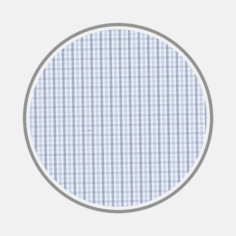 Bespoke Fabric 1118 06 by Turnbull & Asser features intersecting thin blue lines on white, bordered by a gray ring—resembling graph paper and providing perfect inspiration for custom or bespoke shirt designs.