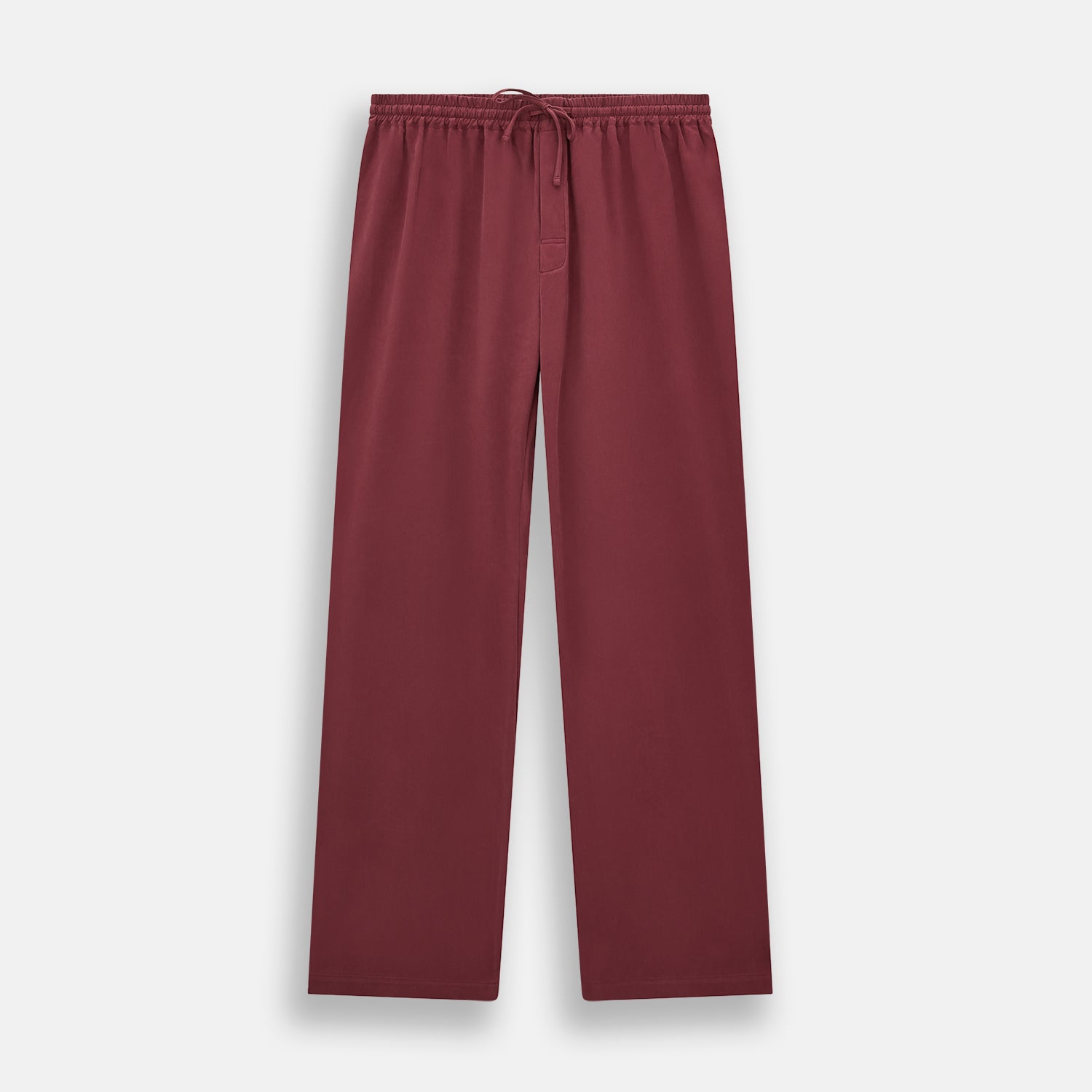 View 6 of product The Turnbull & Asser Burgundy Silk Pyjama Set features a long-sleeve, button-up shirt with chest pocket and matching pants with elastic waistband and side pocket, shown on a white background.