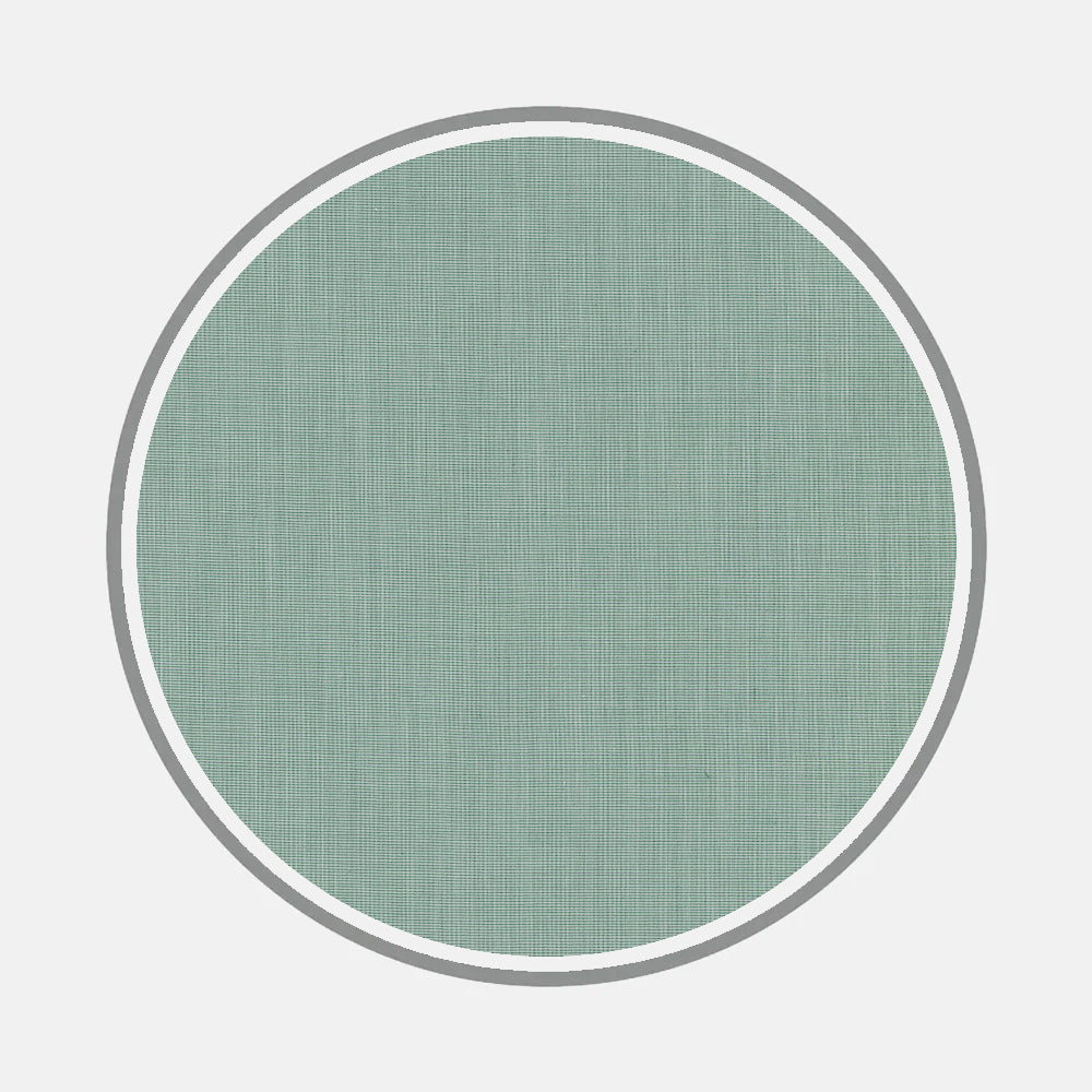 A circular patch of light green Bespoke Fabric 1261 47 by Turnbull & Asser, featuring a textured finish, is centered on a white background and outlined with a thin gray border.