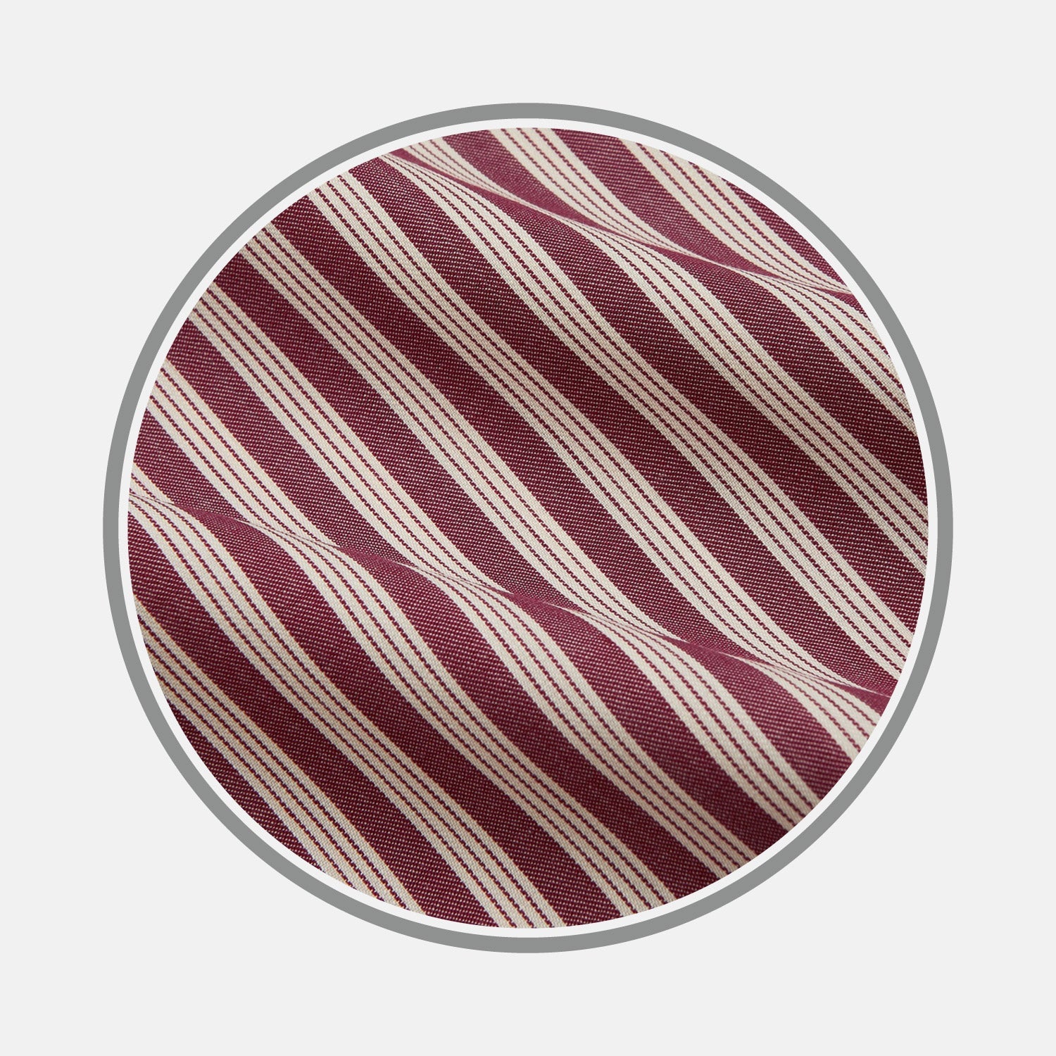 View 1 of product Close-up of BESPOKE FABRIC 1264 34 by Turnbull & Asser with diagonal maroon and white stripes, framed in a circle on a light background—ideal for custom shirts or trying monogram styles.