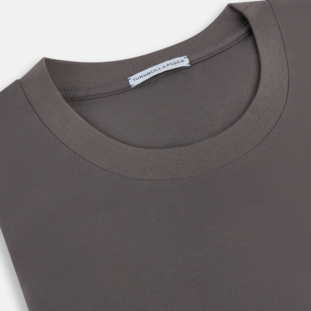 The Turnbull & Asser Shadow Grey Short-Sleeve T-shirt, featuring a classic crew neck and minimalist design with no visible logos, is laid flat on a white background—an ideal versatile staple for everyday wear.