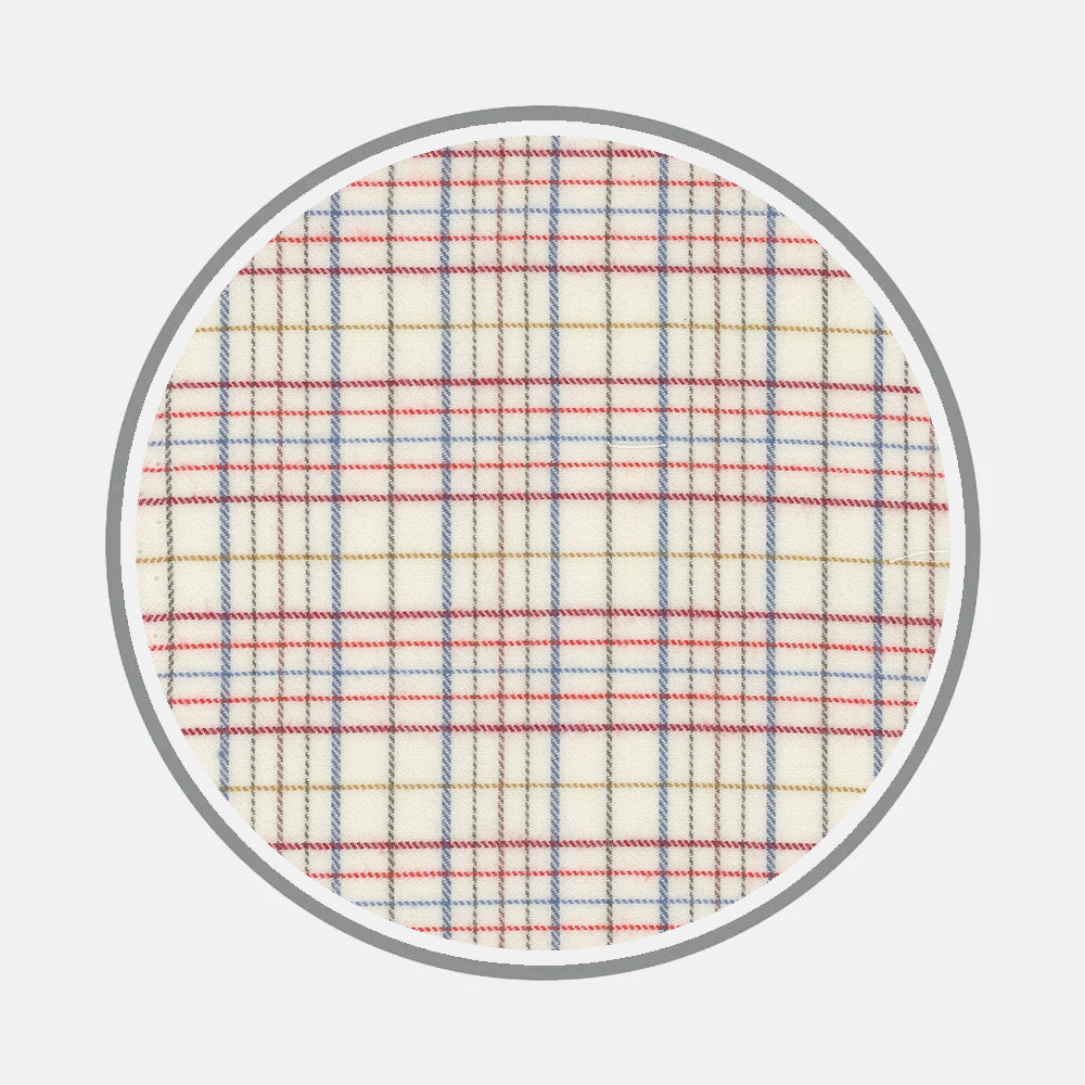 The Turnbull & Asser Bespoke Fabric 1272 34 is a round patch with a plaid pattern in red, blue, and black on a cream background, bordered by gray—ideal for unique shirt details or custom shirt accents.