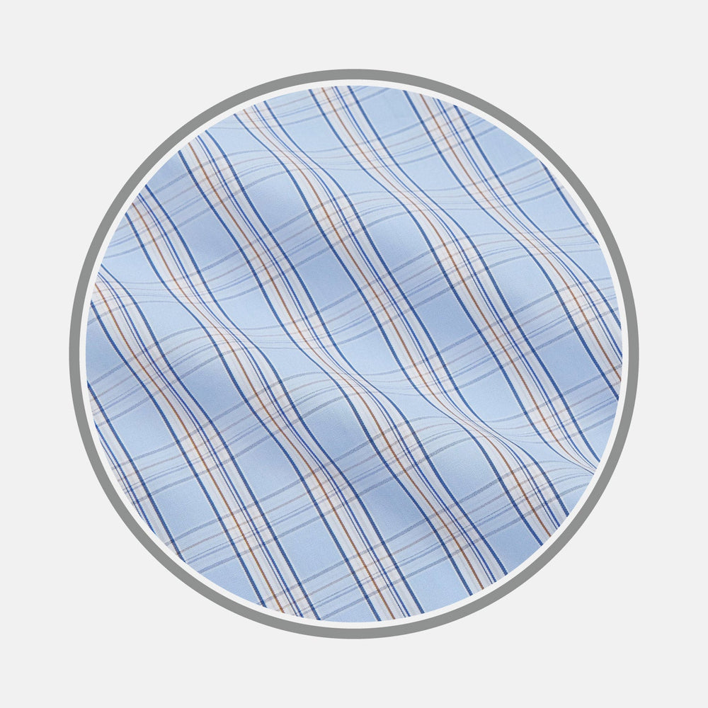 Close-up of Turnbull & Asser's NEW BESPOKE FABRIC 1319 33—light blue plaid with navy, orange, and white lines—shown in a circular frame on a light gray background. Ideal for bespoke shirts.