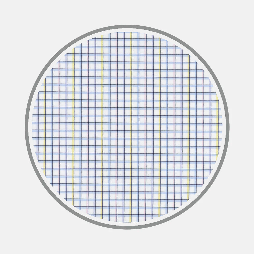 Turnbull & Asser’s Bespoke Fabric 1321 38 features a circular grid with intersecting blue and yellow lines on white, framed by a gray ring—a pattern of small squares that recalls the precision of bespoke monogram shirt designs.
