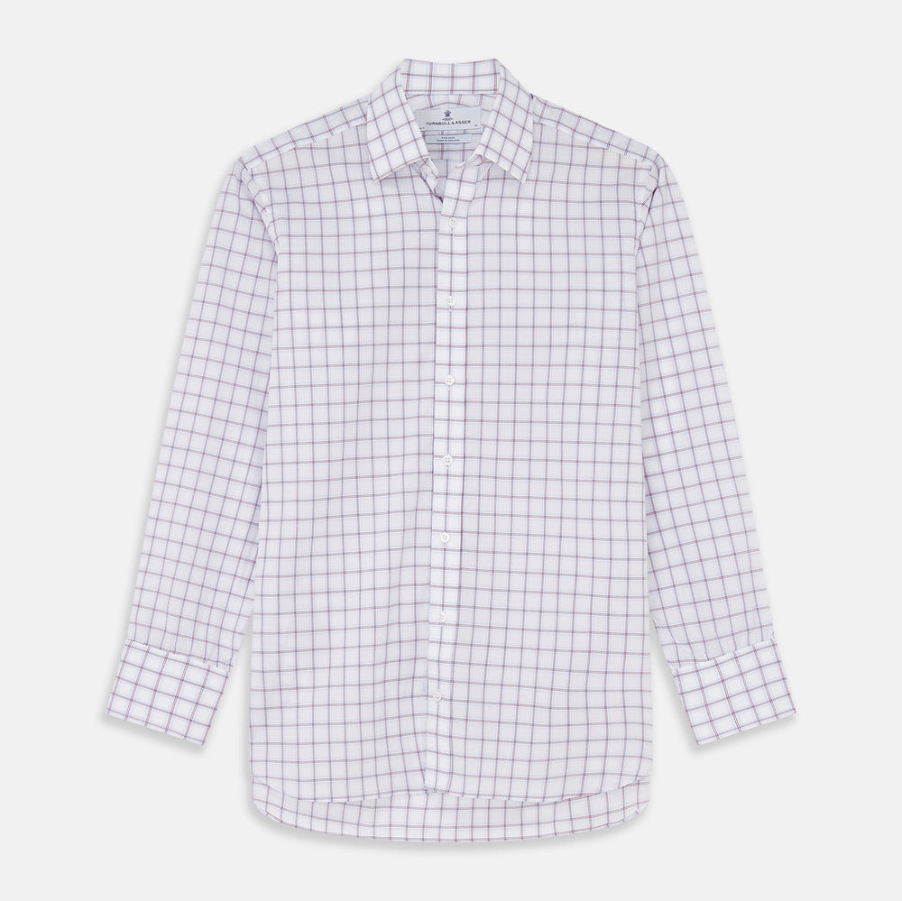 NEW BESPOKE FABRIC 1327 34 by Turnbull & Asser: White fabric with a red and blue plaid design, shown in a circular frame. Perfect for bespoke or custom shirts, the material features intersecting lines forming squares and a slightly wrinkled texture.