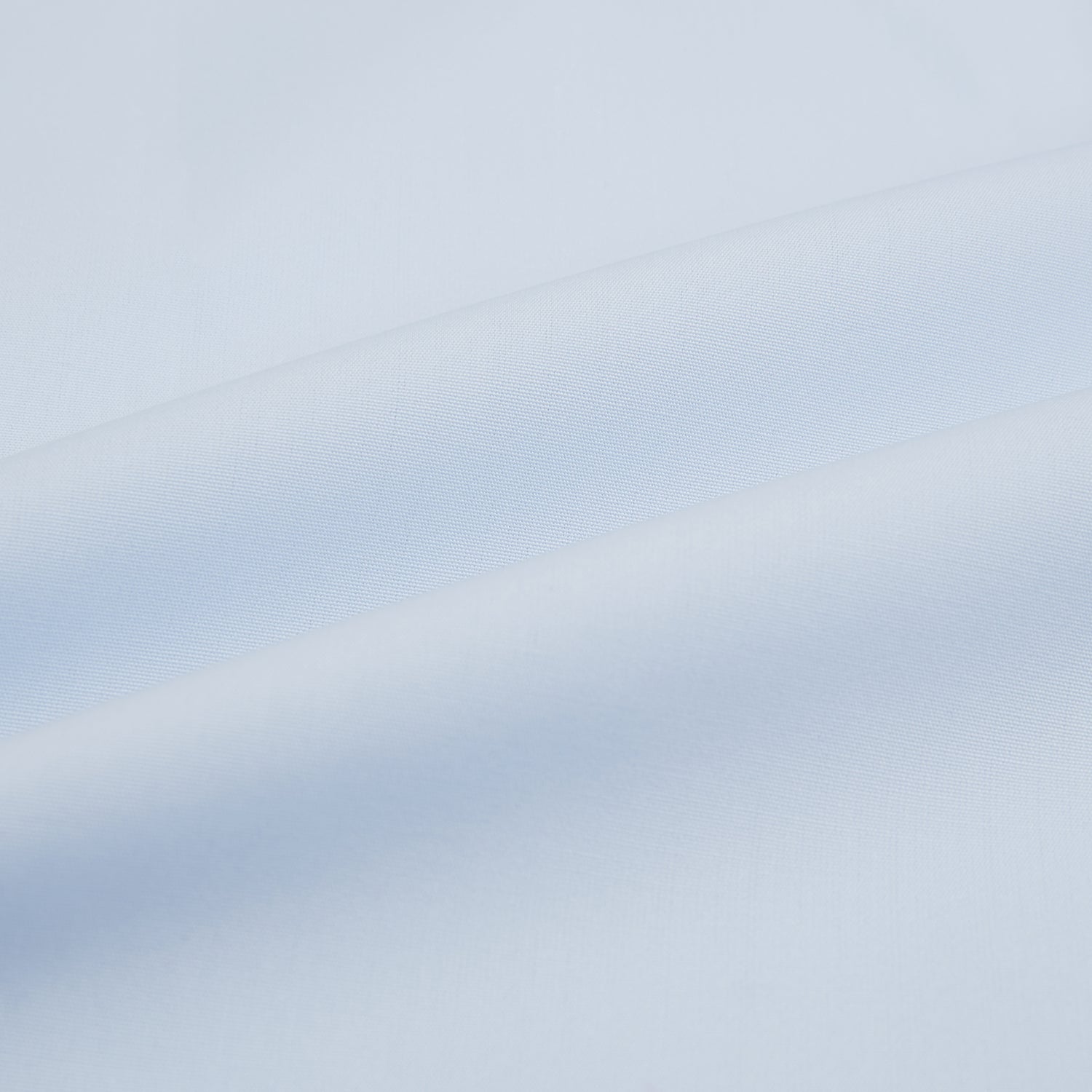 View 6 of product The Light Blue Mayfair Shirt by Turnbull & Asser is a men's cotton dress shirt featuring a pointed collar and button-down front, shown flat on a white background.