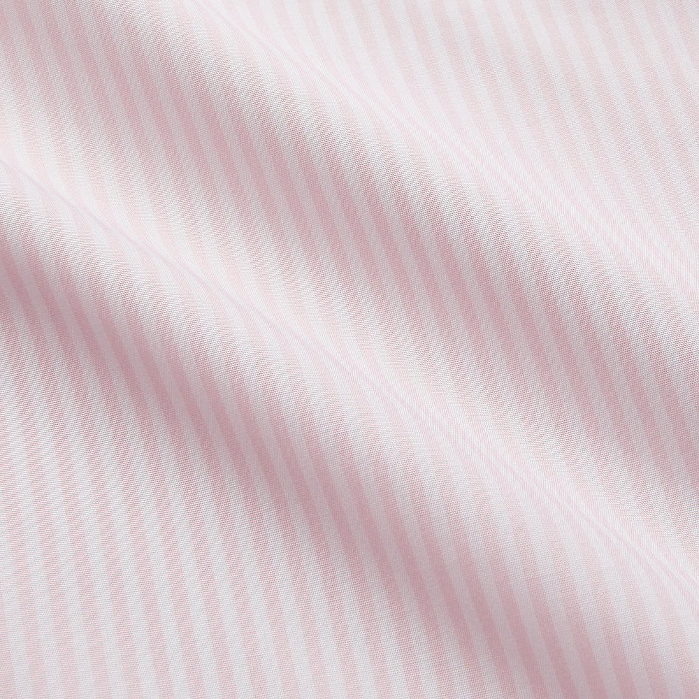 The Turnbull & Asser White and Pink Wide Stripe Shirt with Double Cuffs features a minimalist design, with bold vertical stripes and long sleeves, shown laid flat against a white background.