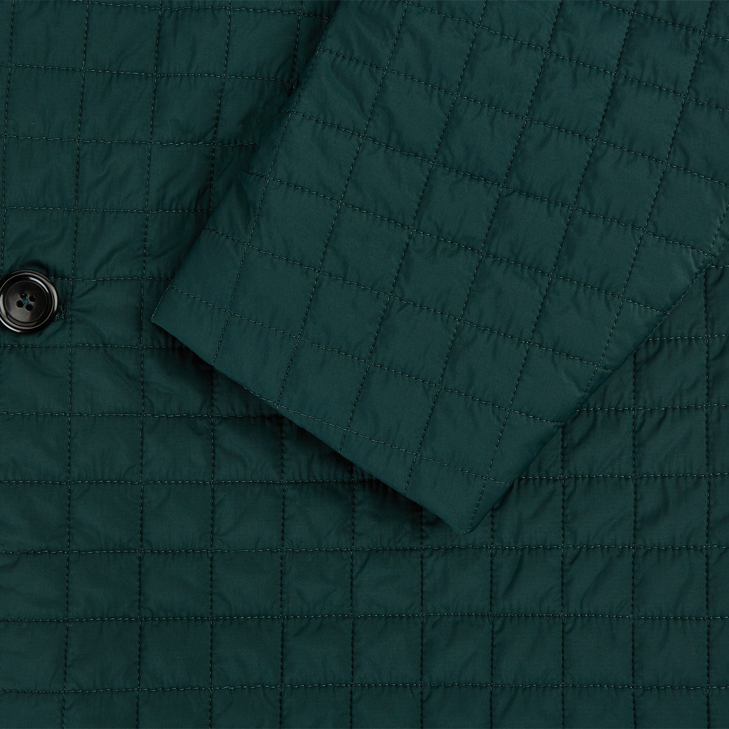 Image 4 of product The Turnbull & Asser Fulham Forest Green Single-Breasted Quilted Blazer features a three-button front, notched lapels, chest pocket, and two front flap pockets—an elegant choice for the modern gentleman on a plain white background.