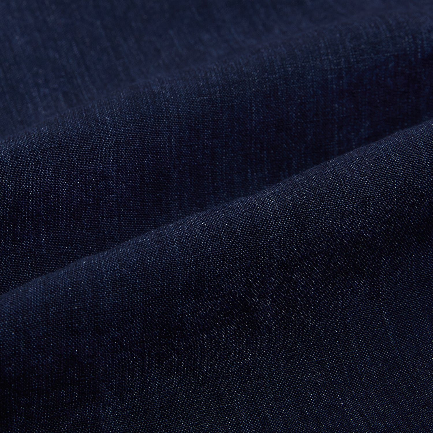 View 8 of product The Navy Linen Westminster Shirt by Turnbull & Asser features a classic collar and buttoned cuffs, exemplifying British craftsmanship. Shown here in long sleeves, the shirt is displayed flat against a white background.
