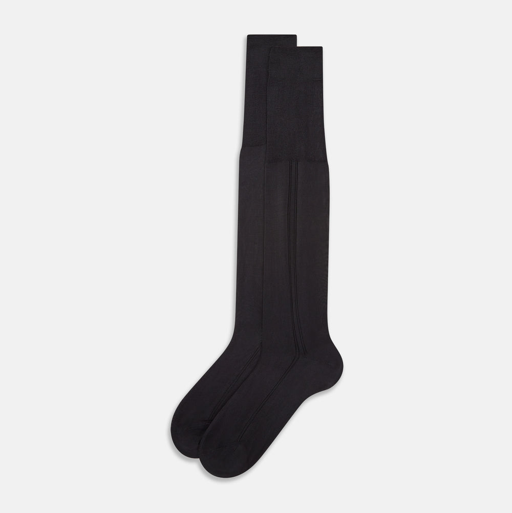 A single Sage Silk Long Sock by Turnbull & Asser, in black, is displayed from a side angle against a plain white background.