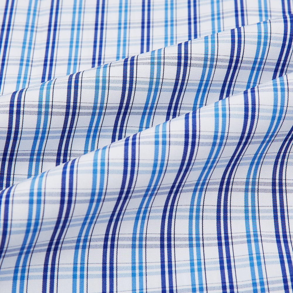 The Turnbull & Asser Blue and Navy Multi Check Mayfair Shirt, made from fine Italian cotton with long sleeves, a button-up front, and a classic collar, is shown against a white background.