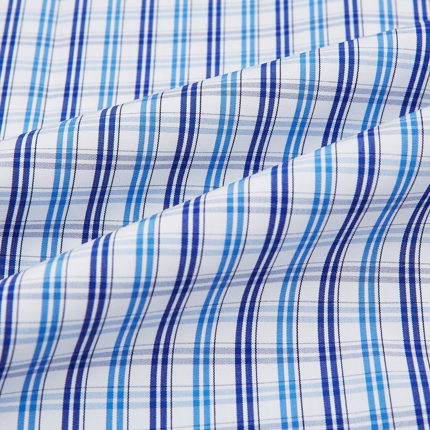 View 6 of product The Turnbull & Asser Blue and Navy Multi Check Mayfair Shirt, made from fine Italian cotton with long sleeves, a button-up front, and a classic collar, is shown against a white background.