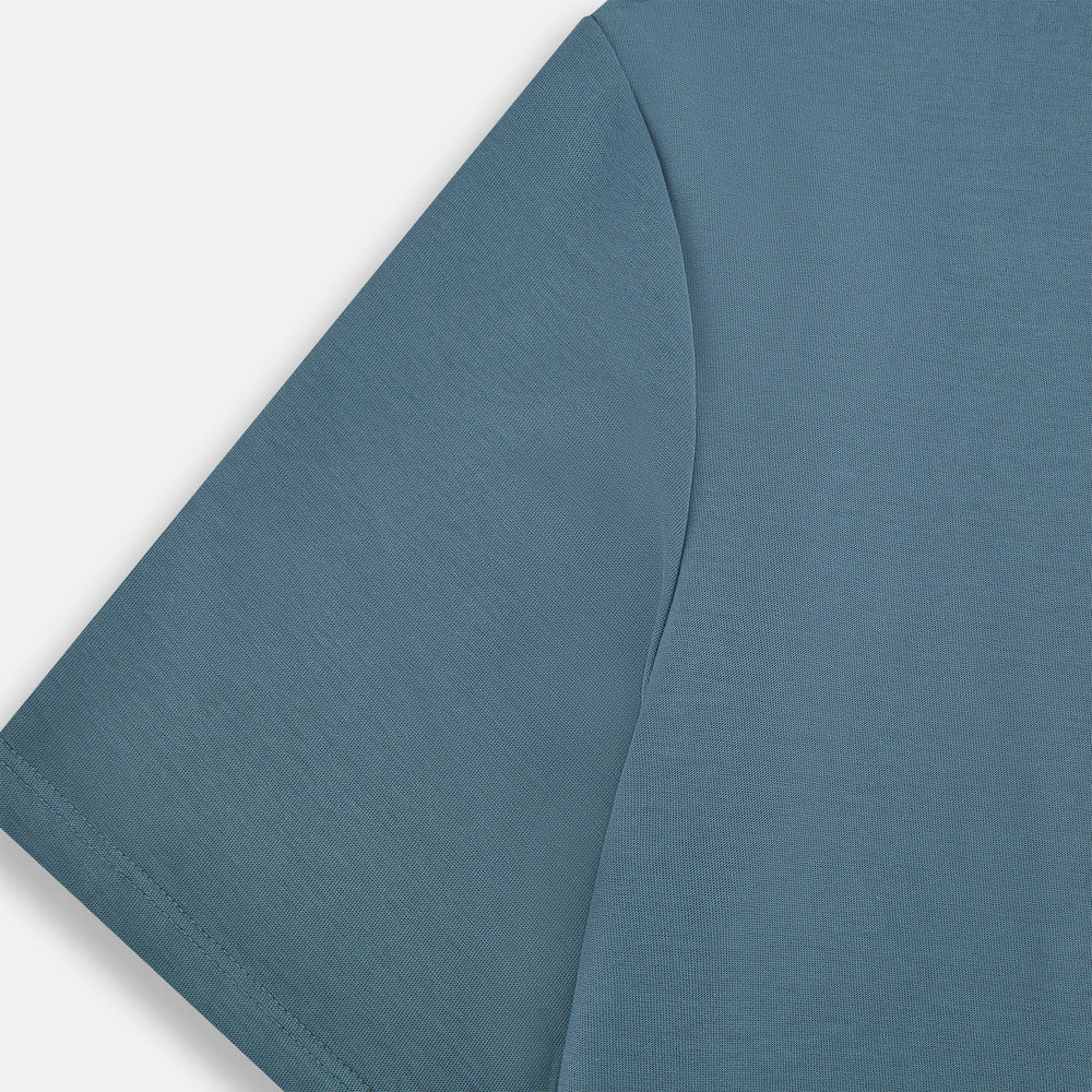 The Turnbull & Asser Pale Blue Short-Sleeve T-shirt features a crew neck and plain design, ideal for everyday wear. Shown flat on a white background.