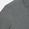 View 6 of product The Pale Charcoal Westminster Shirt by Turnbull & Asser features British craftsmanship with a tailored silhouette, long sleeves, pointed collar, buttoned cuffs, and a solid pale charcoal hue, elegantly shown against a white background.