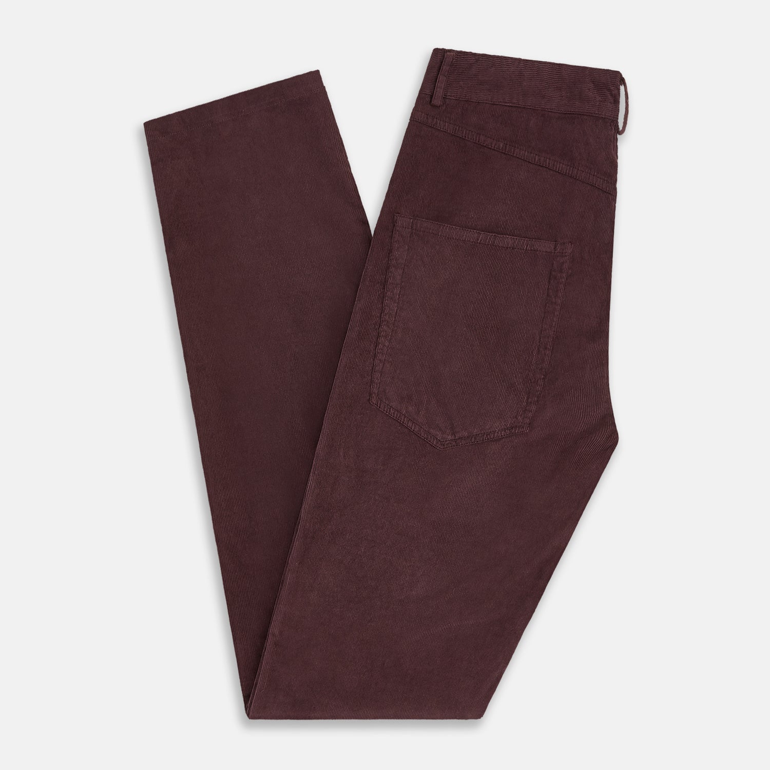Image 6 of product The Turnbull & Asser Burgundy Corduroy Charles Trousers are straight-leg stretch cotton pants in dark burgundy, featuring side and back pockets, shown against a plain white background.