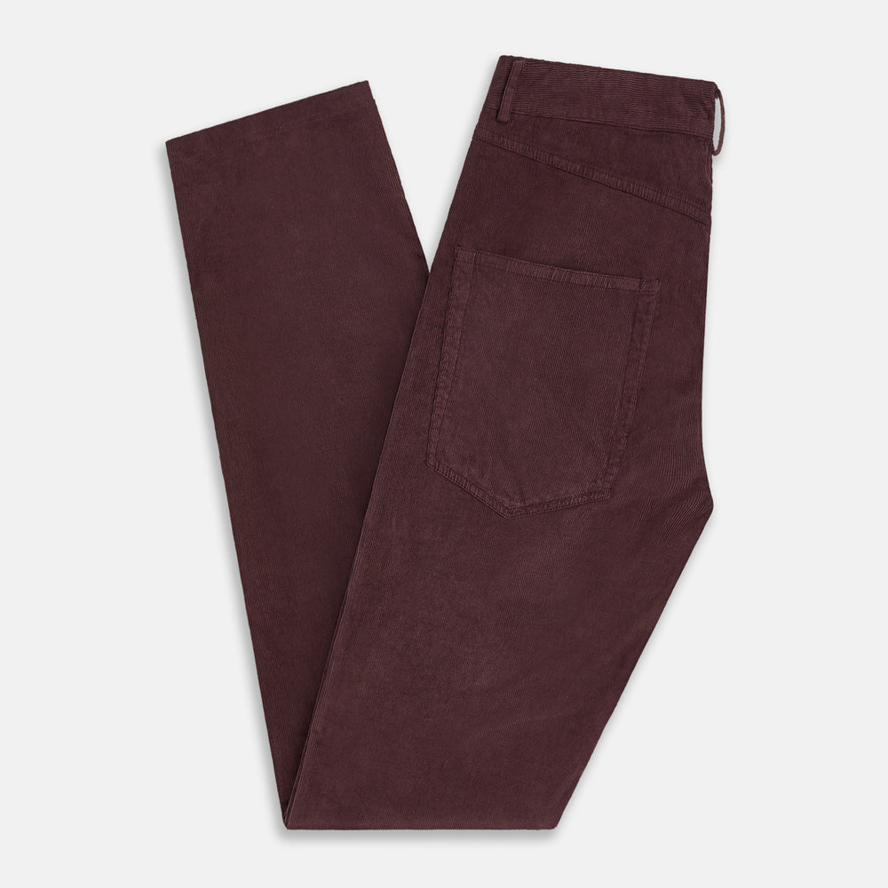 The Turnbull & Asser Burgundy Corduroy Charles Trousers are straight-leg stretch cotton pants in dark burgundy, featuring side and back pockets, shown against a plain white background.