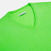 View 2 of product The Turnbull & Asser Bright Green Cashmere V-Neck Jumper features long sleeves with ribbed cuffs and hem—a vibrant addition to your knitwear collection, shown on a plain white background.