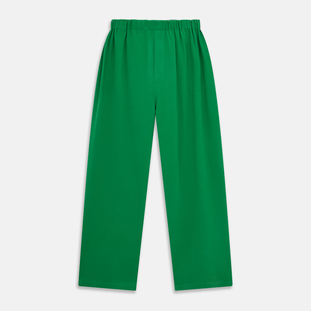 The Turnbull & Asser Green Silk Hyde Pyjamas Set features a long-sleeve button-up top with three pockets and modern fit elastic waistband pants in silk blend, both shown laid flat on a white background.