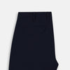 View 13 of product Turnbull & Asser’s Midnight Blue Winston Trousers, in high-twist cotton with belt loops and a button closure, are shown flat against a plain white background.