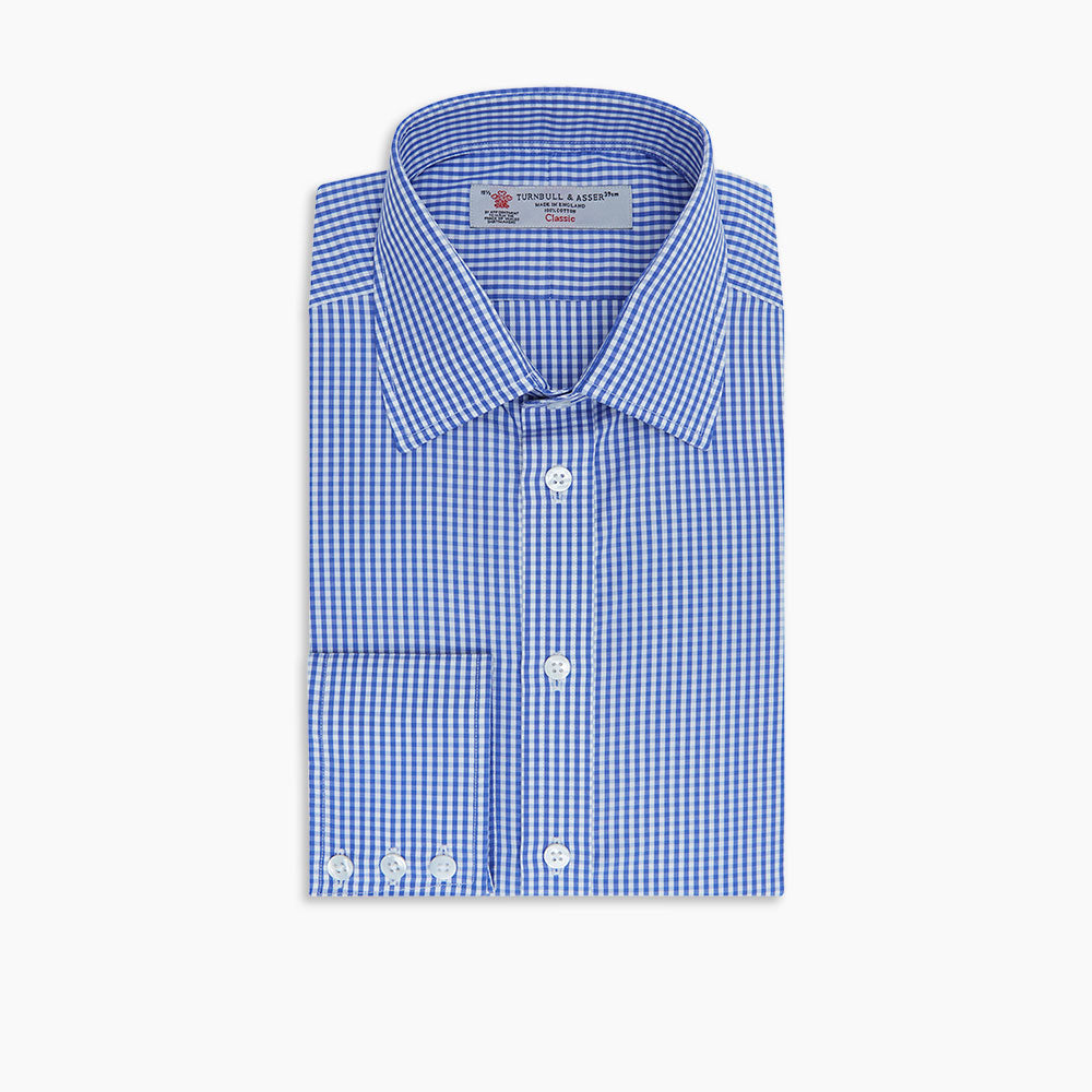 The Turnbull & Asser Mid-Blue Gingham Check Shirt features a T&A collar and 3-button cuffs, crafted from soft cotton and displayed against a plain white background.