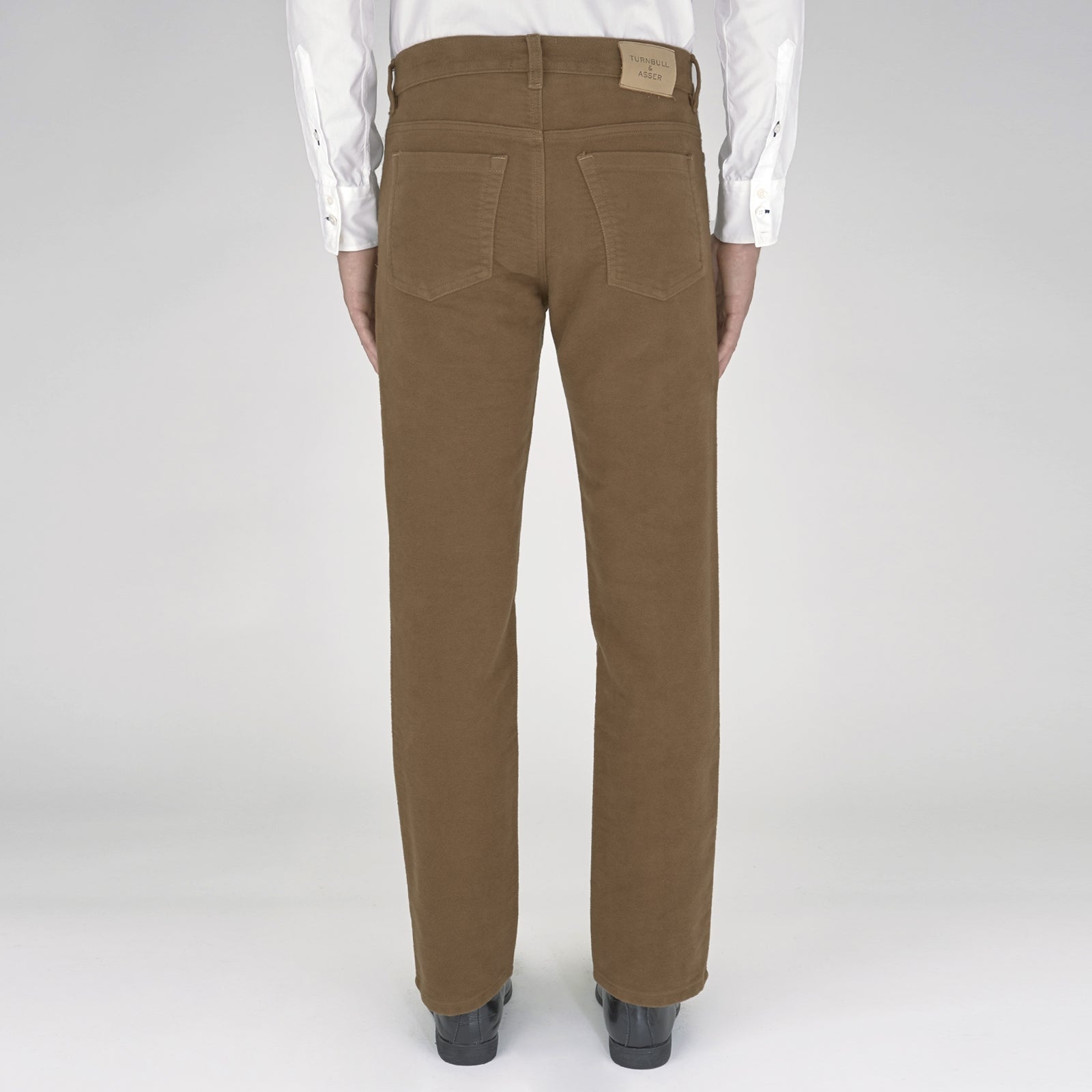 View 3 of product A pair of yellow cotton plain 5 pocket jeans by Turnbull & Asser, featuring a button and zip closure, displayed on a plain white background.
