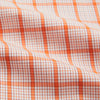 View 5 of product The Turnbull & Asser Orange Graph Overlay Check Mayfair Shirt is a soft organic cotton long-sleeve with button-down front, collar, and cuffs—an ideal capsule wardrobe staple—shown on a plain white background.